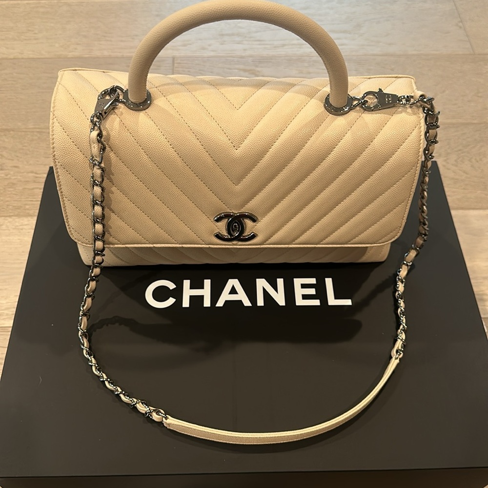 Chanel cream with silver accent plush purse. 12x9 size. Used 9.5/10